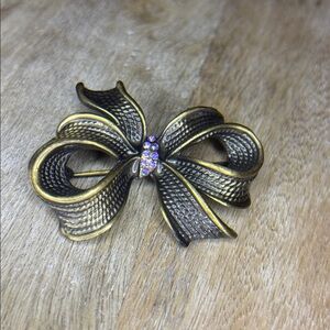 Gun Metal  Purple Ab Centre Decorated Bow Brooch